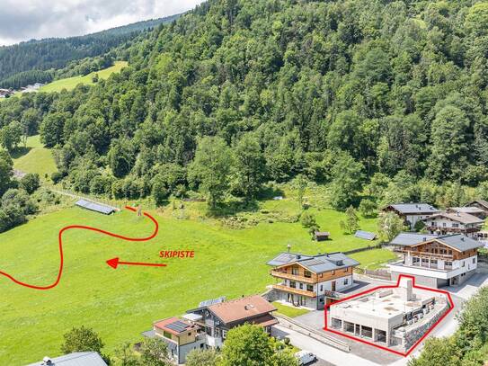 Grundstück an der Skipiste mit Baugenehmigung für ein Luxuschalet