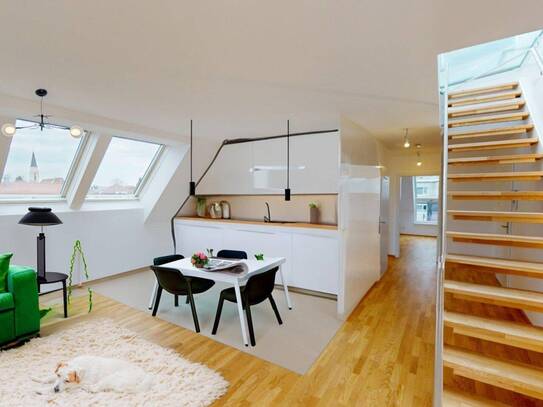 Helle Erstbezugsdachgeschoß-wohnung mit 60m² Dachterrasse - inkl. Garagenplatz in Zentrumsnähe