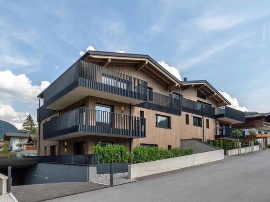 Neubauwohnung im Obergeschoss mit traumhaftem Bergblick ( 06074 )