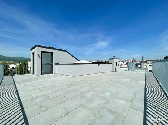 PROVISIONSFREI - NEUBAU | Klimatisierte 4-Zimmer Dachgeschoss-Traum mit Anninger-Blick & riesiger Dachterrasse im Zentr…