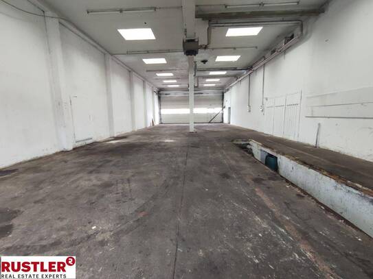 Hallenfläche mit Montagegrube und Büro