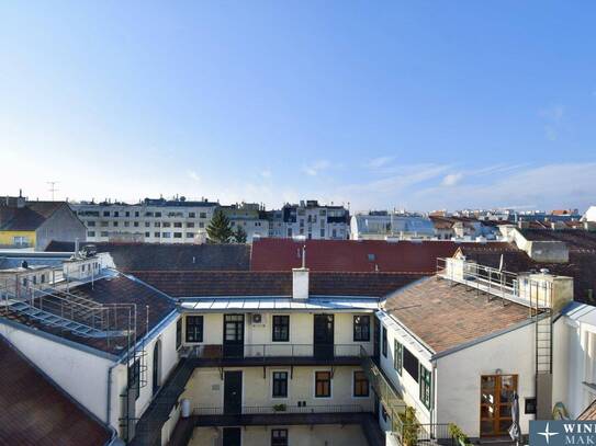 Weitblick, Ruhe & zentrale Lage – Sonnige Altbauwohnung mit Balkon