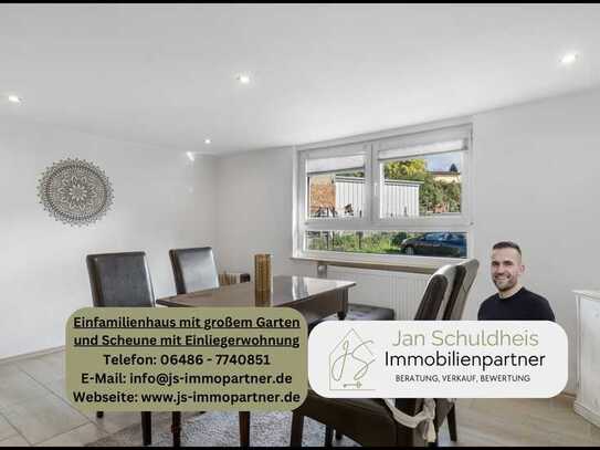 Einfamilienhaus mit großem Garten und Scheune mit Einliegerwohnung