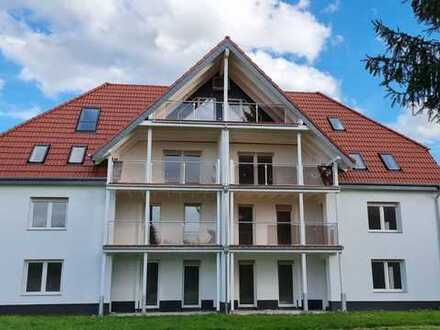 Neuwertige 4 Zi-Wohnung mit einem Großem Balkon u. Autostellplatz!