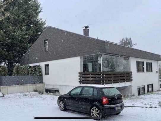 Wunderschöne Erdgeschosswohnung mit Wintergarten, Terasse und Garten und Blick ins Grüne