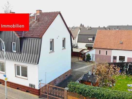 Kleines Anwesen mit vielen Möglichkeiten! 2-Familienhaus mit großer Scheune und idyllischem Garten!