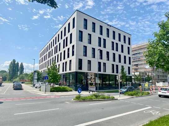 Modernes Büro mit Dachterrasse und Bergblick