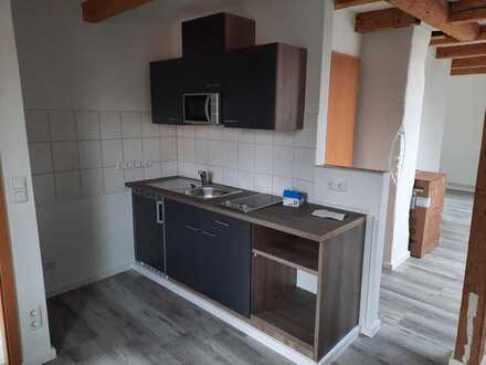 Freundliche 1-Zimmer-Dachgeschosswohnung mit Einbauküche in Goslar