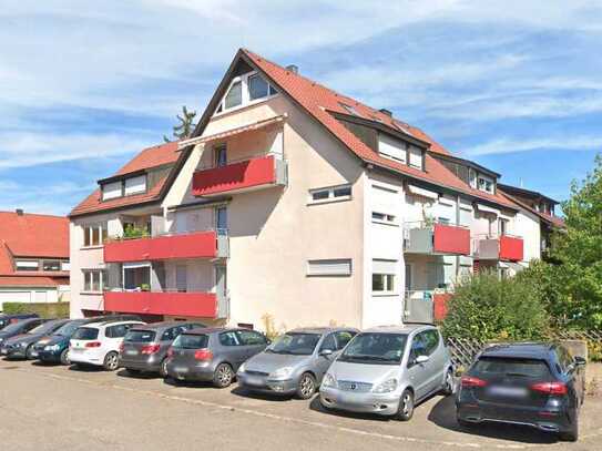 vermietete 3,5-Zimmer-Maisonette-Wohnung mit Bühnenraum, Balkon und Stellplatz