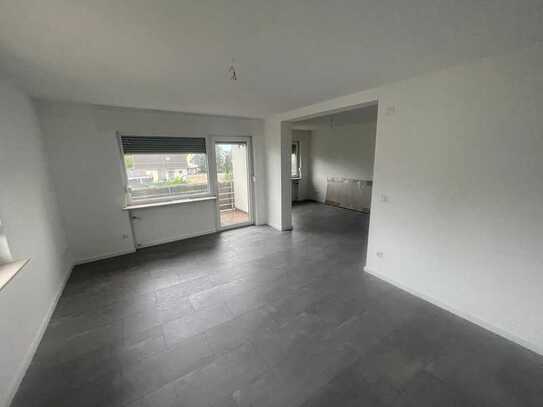 Kernsanierte 3-Zimmer-Wohnung mit Balkon, 80m² Garten und 2 Tageslicht Bädern in Raunheim