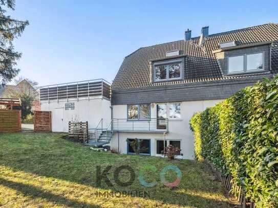 Zweifamilienhaus mit Süd-Terrasse und großem Garten in zentraler Lage!