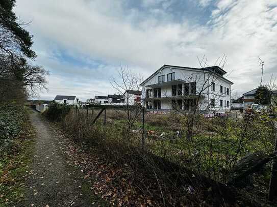 Luxuriöse Neubau-Dachgeschosswohnung mit Bad en Suite, Ankleidezimmer und hohen Decken