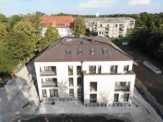 In Kürze bezugsfertig: 4-Zi.-Erdgeschosswohnung mit Terrasse in Münchener Nähe