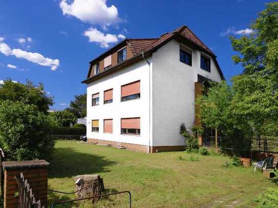 Helles Massivhaus mit 3 Wohnungen, großer Garten, Garage, Keller, Balkon...