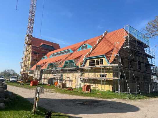 Erstbezug: Barrierefreie Gartenwohnung mit Terrasse in ehemaligem Stallgebäude