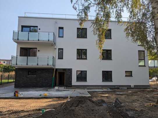 Neubau! Barrierefreie 3-Zimmer Wohnung mit Balkon im ruhigen Hinterhof!