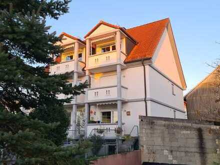 Minfeld: freundlich helle EG-Wohnung mit Süd/West-Balkon, Stellplatz und kleinem Garten