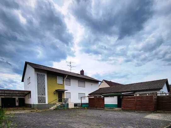 Wohn- und Geschäftshaus mit Gewerbehalle, Garage im Gewerbegebiet mit vielen Nutzungsmöglichkeiten