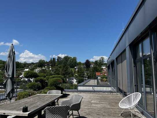 Residieren im Four Site: Exklusives Penthousebüro mit See- und Gebirgsblick in bester Lage