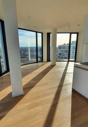 Luxuriöse Penthouse-Eckwohnung mit Alpen- und Stadtblick