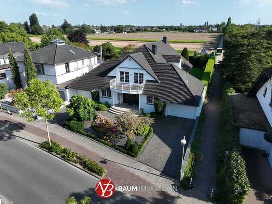 Exklusive Landhausvilla mit Innenschwimmbad auf Süd-Grundstück in Golfplatznähe von Alt-Meererbusch