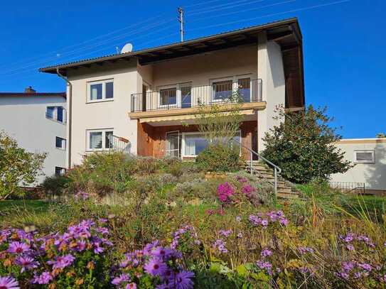 Einfamilienhaus mit Einliegerwohnung und großzügigem Gartenparadies