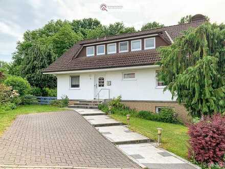 Einfamilienhaus mit Einliegerwohnung, auf wunderschönem Gartengrundstück in Hanglage!