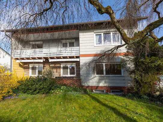 Kinderfreundliche Erdgeschosswohnung mit Garten, Garage und Carport