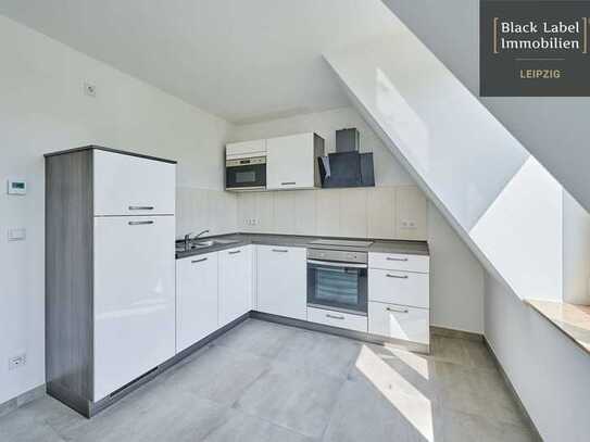 Neuwertige Dachgeschoss-Wohnung mit Balkon, per Aufzug bequem zu erreichen
