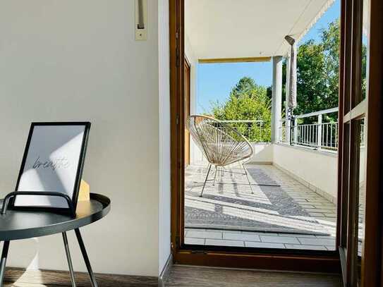 Coole, stylische Stadtwohnung im ruhigen Hinterhof mit großem Südbalkon, Bergblick und Tiefgarage