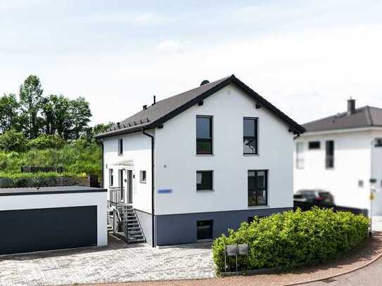 Effizienzhaus 55 mit Einliegerwohnung: funktional, ästhetisch und Innovation vereint