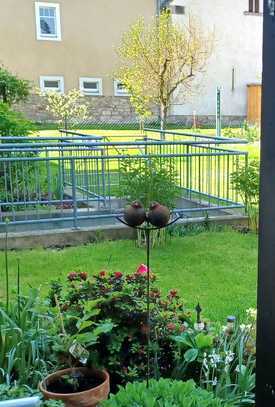 Ansprechende 3 Zimmer- Wohnung mit Terrasse und kleinem Garten im alten Dorfkern