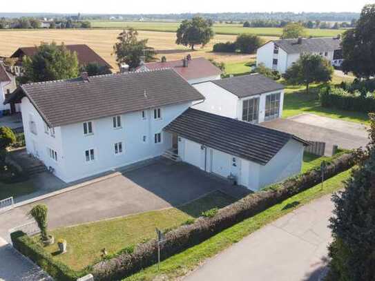 Kapitalanlage mit Potential! Zweifamilienhaus mit Garten und Doppelgarage