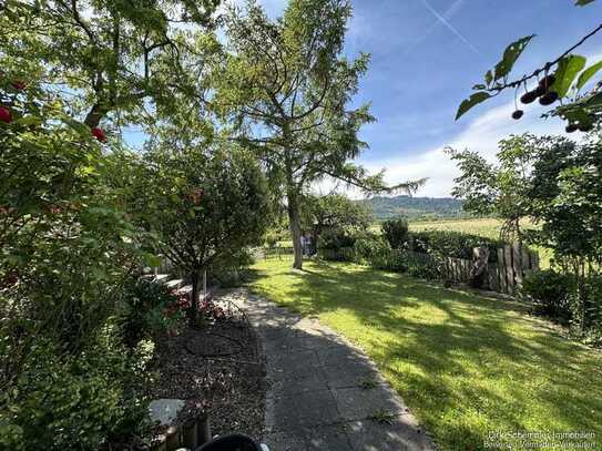 Charaktervolle Erdgeschosswohnung mit Gartenidylle und außergewöhnlichem Flair