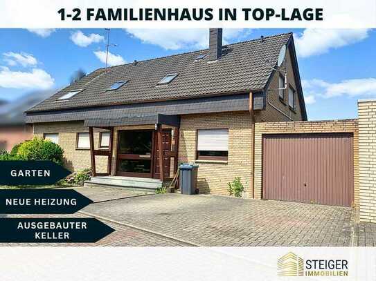 Charmantes Ein- bis Zweifamilienhaus mit großzügigem Wohnraum-ausgebautem Keller-Garten und Garage!