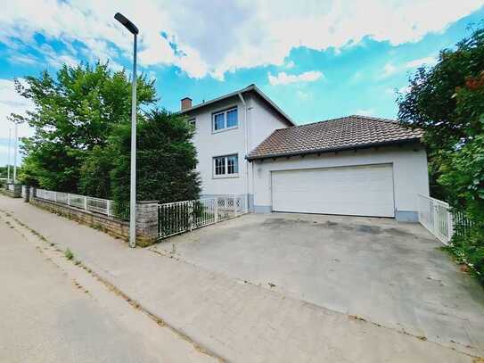 Saulheim, großes Einfamilienhaus mit Südwest-Garten, Pool und imposanter Garage