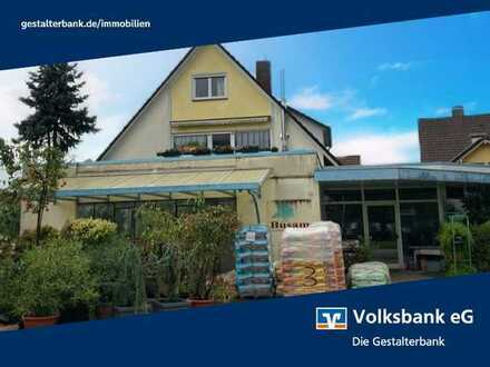***Renovierungsbedürftiges, vermietetes Haus mit Ladengeschäft in Lautenbach: Potenzial für Investor