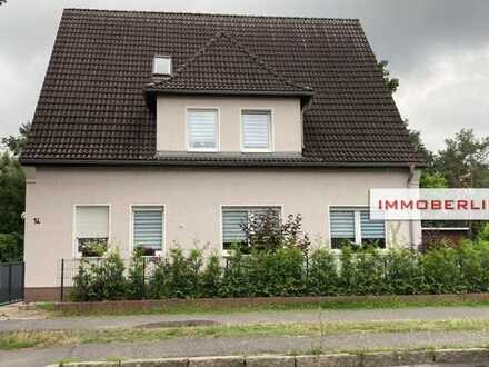 IMMOBERLIN.DE - Attraktives Haus mit Südgarten in familiärer Lage