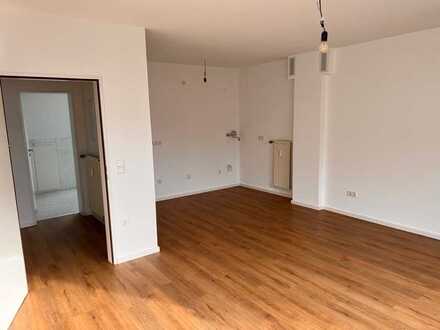 1 Zimmer Dachgeschoss Wohnung mit Balkon
