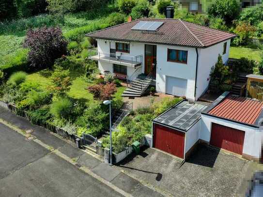 Gepflegtes Einfamilienhaus mit traumhaftem Panoramablick und ruhiger Lage!