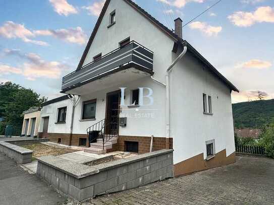 Attraktives Zweifamilienhaus in Nahbollenbach: mit Platz für die ganze Familie