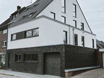 Barriere-freie, geräumige 3,5-Zimmer-Wohnung mit 9-Meter Garage und Garten