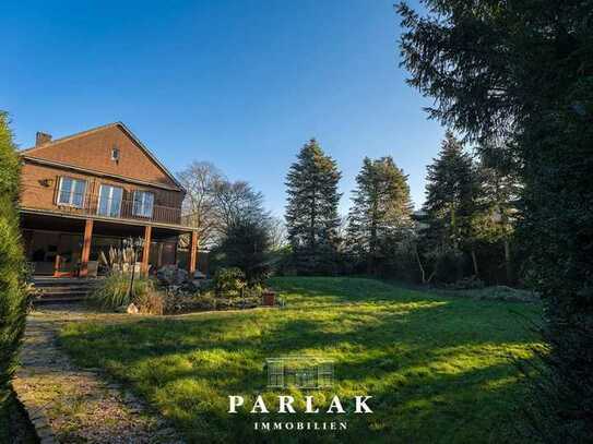 Idyllisches Anwesen: Elegantes Einfamilienhaus umgeben von parkähnlicher Natur!