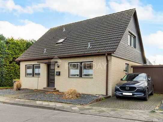 Familien aufgepasst! Freistehendes EFH mit schönem Grundstück, Garage und viel Platz in Gustorf