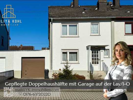 Gepflegte Doppelhaushälfte mit Garage, Garten und ausgebautem Dachgeschoss in ruhiger Lage