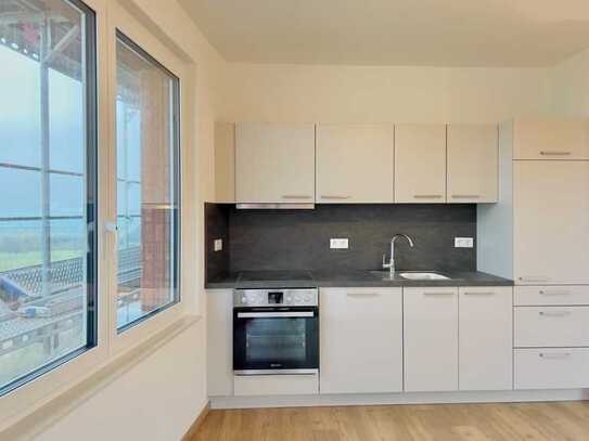 Hannover Kronsrode Neubau: Einbauküche, Süd-Balkon, Gäste-WC, Fußbodenheizung, Tiefgarage, Lift etc.