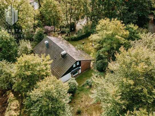 Charmantes Einfamilienhaus auf großzügigem Hanggrundstück in Jesteburg