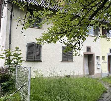 Sanierungsbedürftiges Dreifamilienhaus mit Potenzial