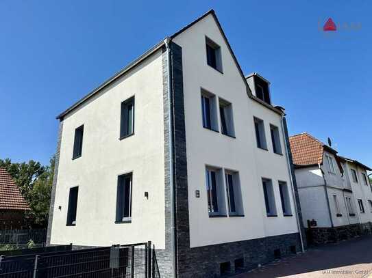 Moderne 3,5 Zimmerwohnung. Terrasse und Wintergarten (EG).