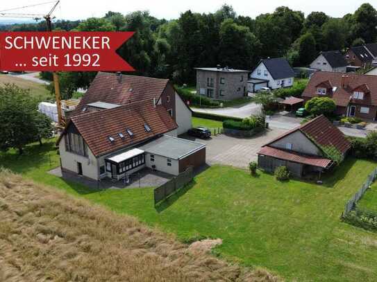 Wohnen oder vermieten in Bünde-Dünne! Dreifamilienhaus auf großem Grundstück + verpachteter Ac